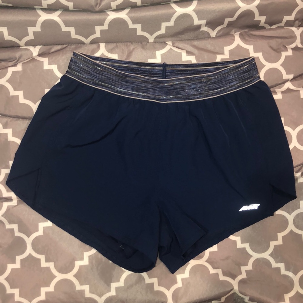 AVIA blue shorts. With built in shorts